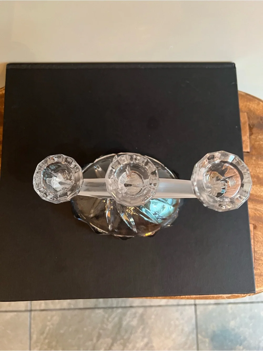 Glass candle holder Features a unique asymmetrical 